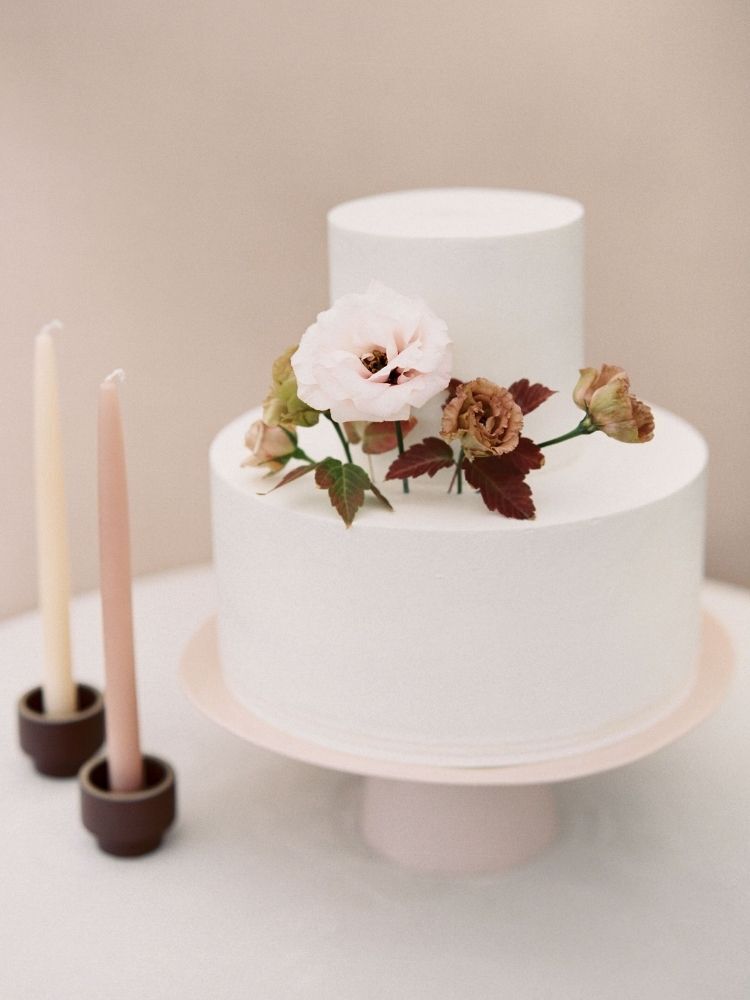 Simple wedding cake with rustic lisianthus bloom decoration