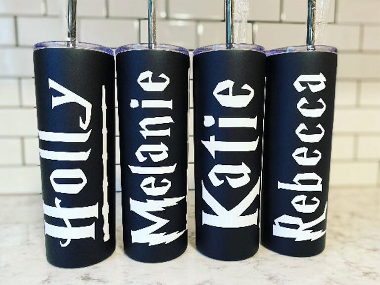 Personalized black tumblers in white HP font