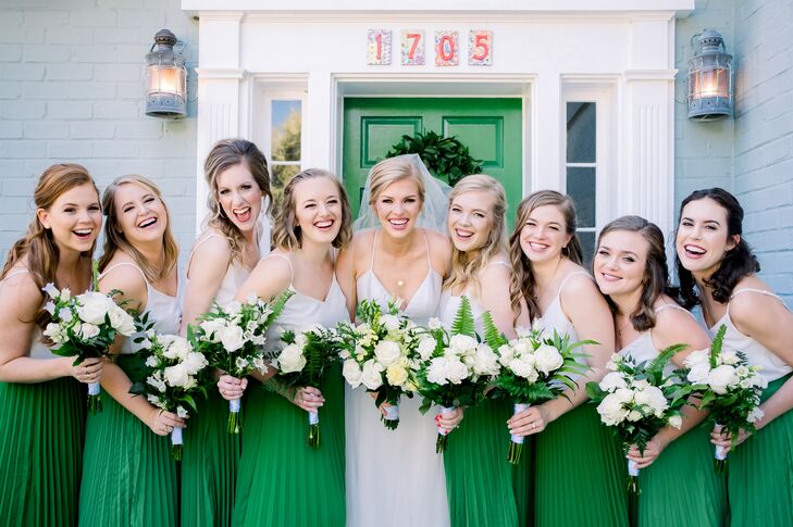 Bridesmaids with Green Gowns, Down Hairstyles and Bouquets