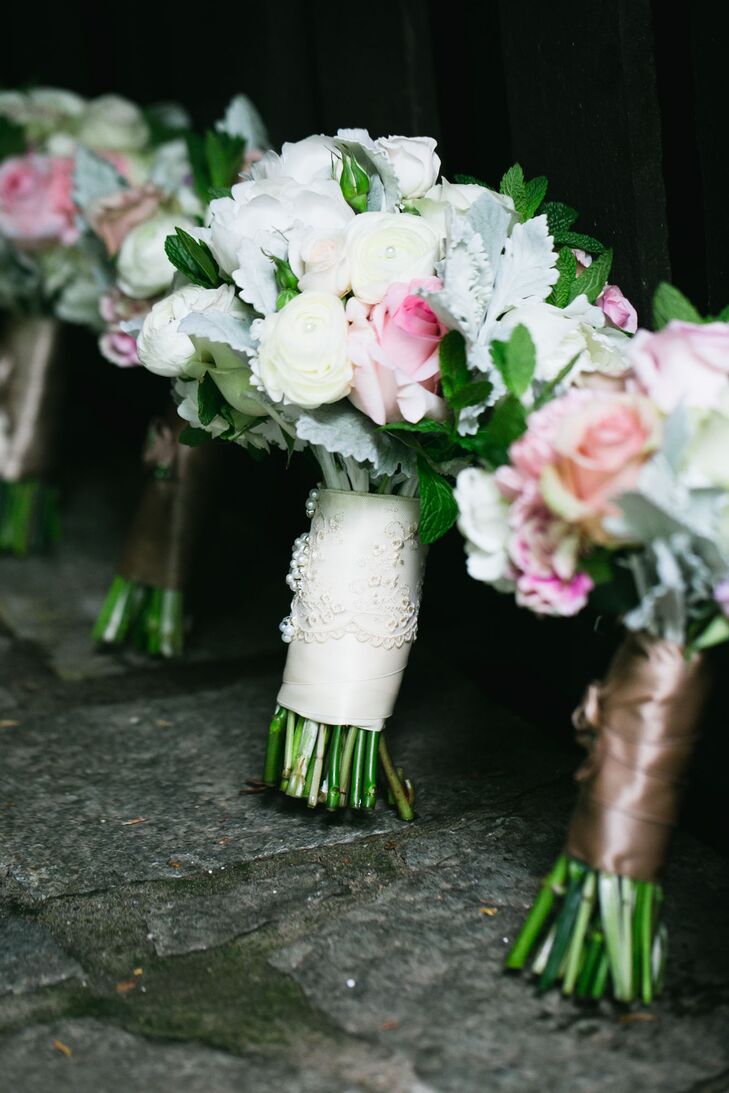 Raquel chose a pastel-colored lush bouquet arranged with a mix of roses, peonies and dusty miller, which was wrapped in white ribbon and lace. "Since it was springtime, the flowers were all in perfect season, and the colors were all in the muted pastels as well," Raquel says.