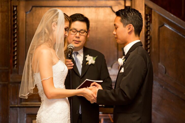 Couple Holding Hands at Ceremonial Altar