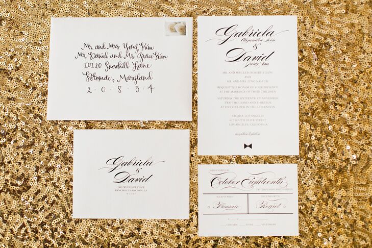 Tawny Tsang Calligraphy designed the elegant white wedding invitations with classic black script letterpress.