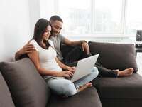 Couple looking at online registry