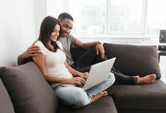 Couple looking at online registry