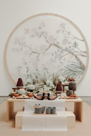 Traditional Korean Paebaek Tea Ceremony Space With Food, Tea and Hand-Painting Backdrop