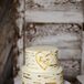 Going along with their natural, rustic theme, Jada and Ryan’s wedding cake was perfect. It looked like birch wood, with their initials carved in the center.