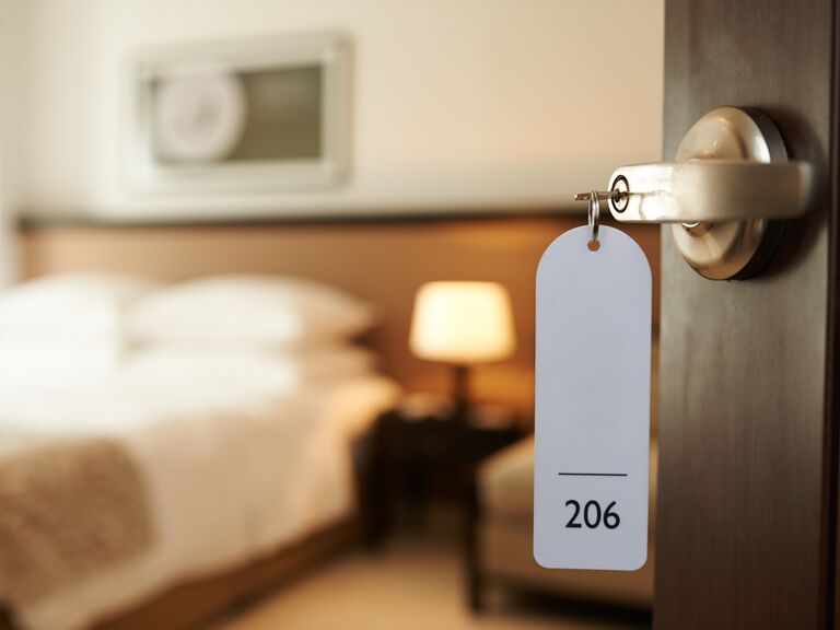 Hotel room with key in door