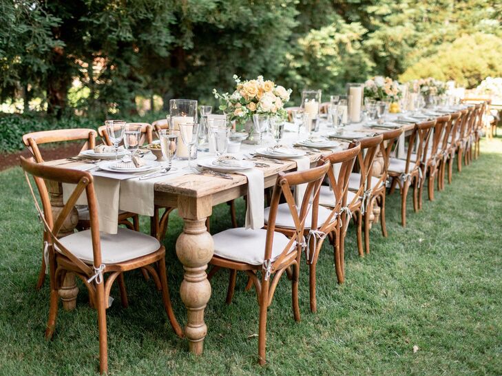 Wood Dining Table with Cross-Back Chairs in Backyard Reception