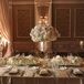 "Our reception was in the Grand Ballroom, where everything from the carpet print to the chandeliers matched the palette and vibe we wanted," Sarah says. She outfitted the Waldorf Astoria in Orlando, Florida with florals of different heights in mercury-glass vessels, along with and crystal candelabras with candlesticks that "matched perfectly with our neutral palette."
