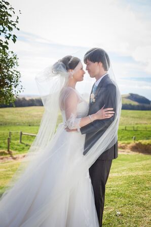 Intimate Shot Underneath Ivory Wedding Veil