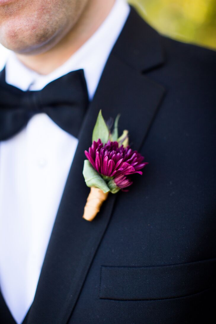 Eric and the groomsmen wore small, simple purple mum boutonnieres.