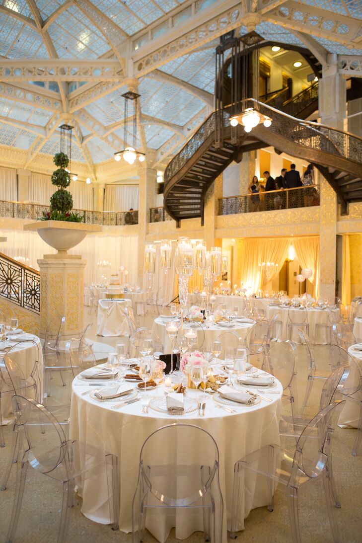 Emily and Tyler immediately fell in love with the Rookery—a historic landmark in the heart of Chicago's financial district—from the moment they set foot inside the building. "We held our wedding in the light court, which features white marble and wrought-iron staircases," Emily says. "We wanted to incorporate as much of our venue into our design as possible."
