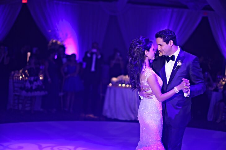 Colleen and Jarrad took their first dance together on the dance floor inside the ballroom at Intercontinental  Cleveland. Jarrad wore a classic charcoal tuxedo accented with a bow tie, while Colleen wore an elegant lace wedding dress designed by Reem Acra.