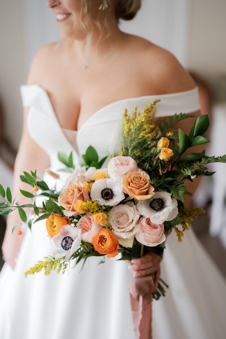 Off-the-Shoulder Wedding Gown With Bright Bridal Bouquet
