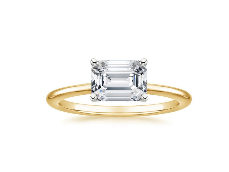east west emerald cut diamond engagement ring in solitaire setting