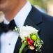 Classic White Rose and Hypericum Boutonnieres
