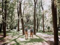 Men pose for a western engagement photo shoot