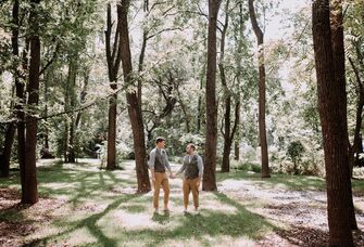 Men pose for a western engagement photo shoot