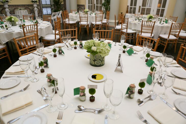 “Our colors were mainly off white and different shades of green,” says Jennifer We wanted a feeling of freshness, life, and renewal. We used a lot of white and green hydrangea with sliced lime circles for the centerpieces.”