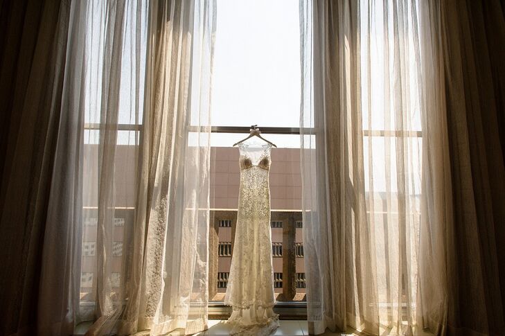 The bride wanted a dress that would be simple and elegant, and that would be comfortable for her to dance in. "My favorite part of the dress was that it had blue stitching, so I was excited to get blue shoes to match," Leah says.