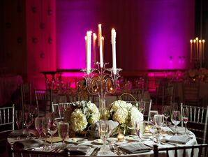 Candelabra Centerpieces and Purple Uplighting