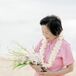A Bride at Her Beach Vow Renewal and 50th Anniversary in Pink Suit, Bouquet