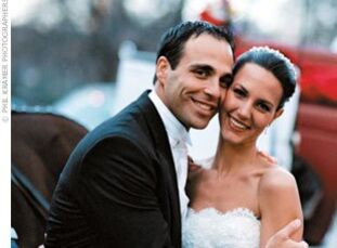 Rich red tones brought warmth to Meri and Stephen's chic city winter wedding, complete with an orchid-covered huppah and 11-piece Motown band.   THE B