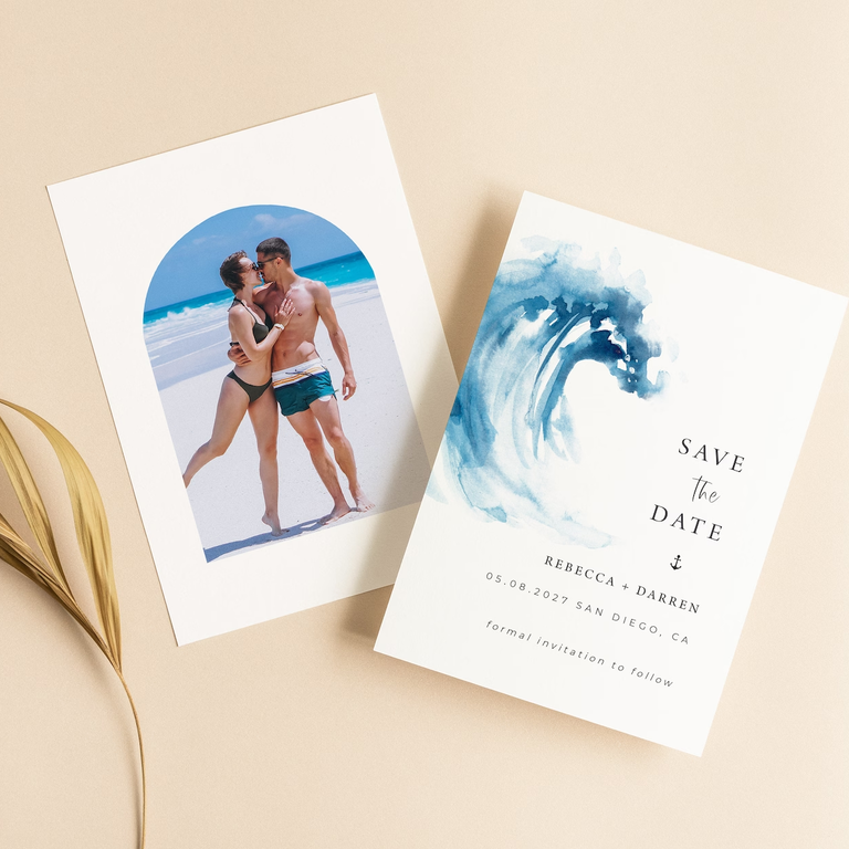 Whimsical blue-and-white beachside save-the-date cards