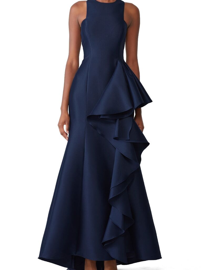A halter neck navy maxi gown with a ruffle detail on the skirt from Rent The Runway