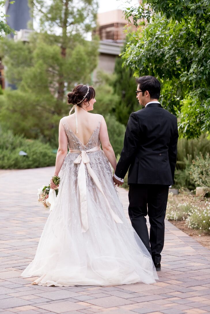 Anna customized her wedding gown by adding a long ribbon around the waist.