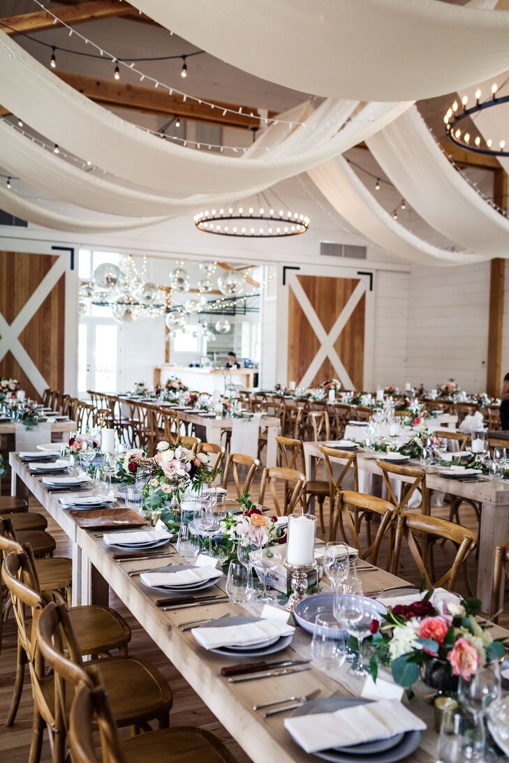 Romantic Barn Reception with Airy Draping and Cross-Back Chairs