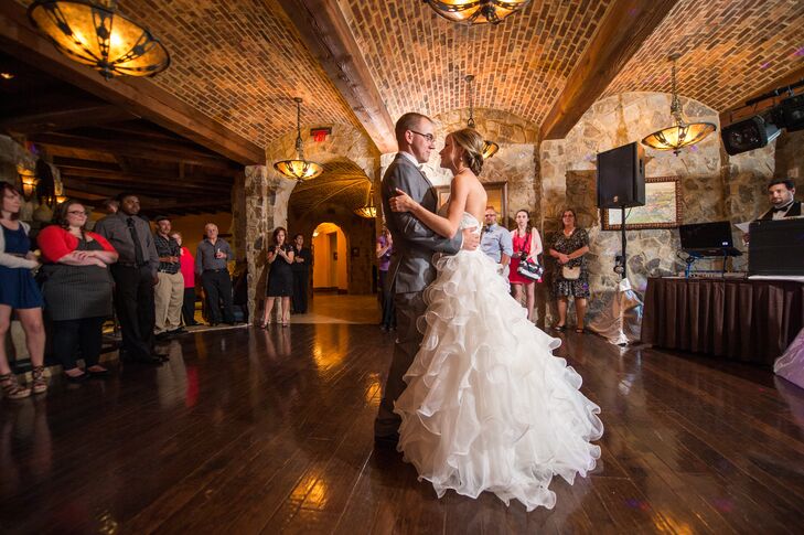 The couple took their first dance surrounded by 50 friends and family members.
