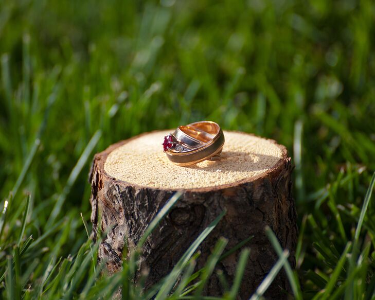 Eric proposed with a teardrop ruby ring. They paired it with a simple gold band at the wedding.