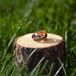 Eric proposed with a teardrop ruby ring. They paired it with a simple gold band at the wedding.