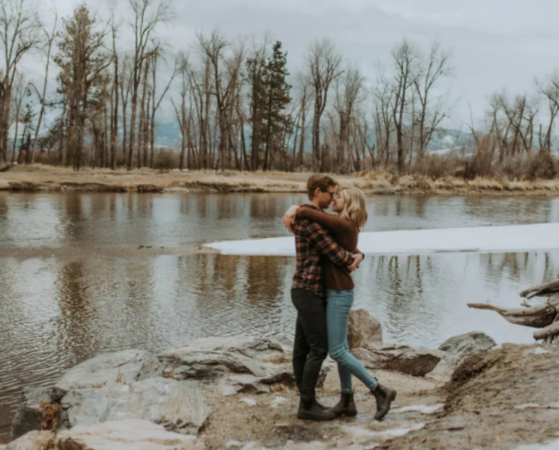 An engagement photo of Jenna & Luke on the lakeside