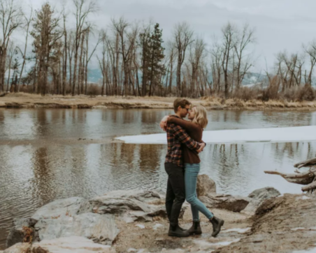 An engagement photo of Jenna & Luke on the lakeside
