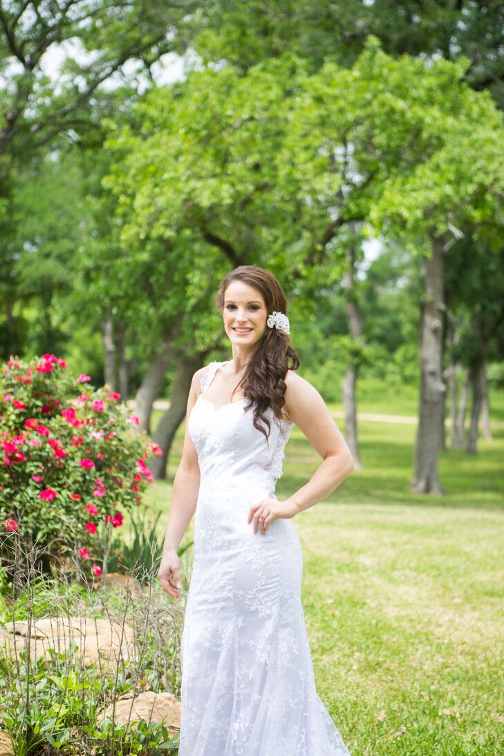 Melinda got married in a white wedding dress with pearl and crystal beading and a sweetheart neckline. The most stunning part of her wedding dress? The open back with draped pearl beading, which added an ethereal elegance to her style.