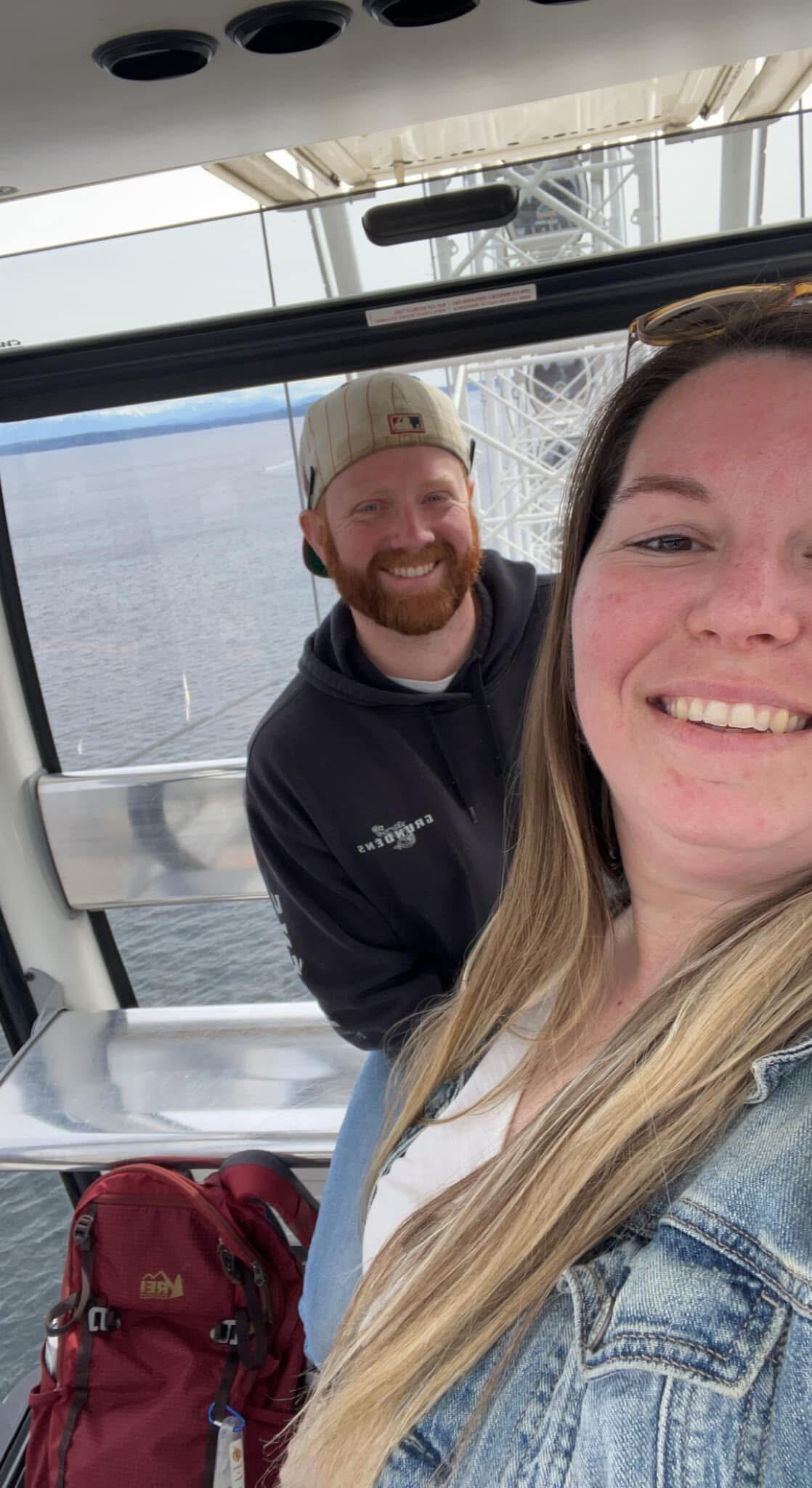 After six years, Sean proposes on The Great Wheel at the Seattle Waterfront.  Katie's very surprised!