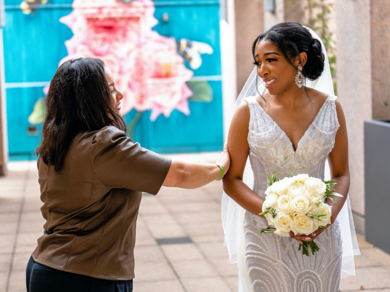 event planner comforting bride