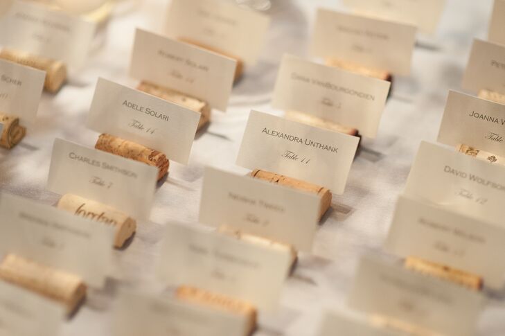 In keeping with the wine theme, escort cards were displayed in cork stopper place holders.