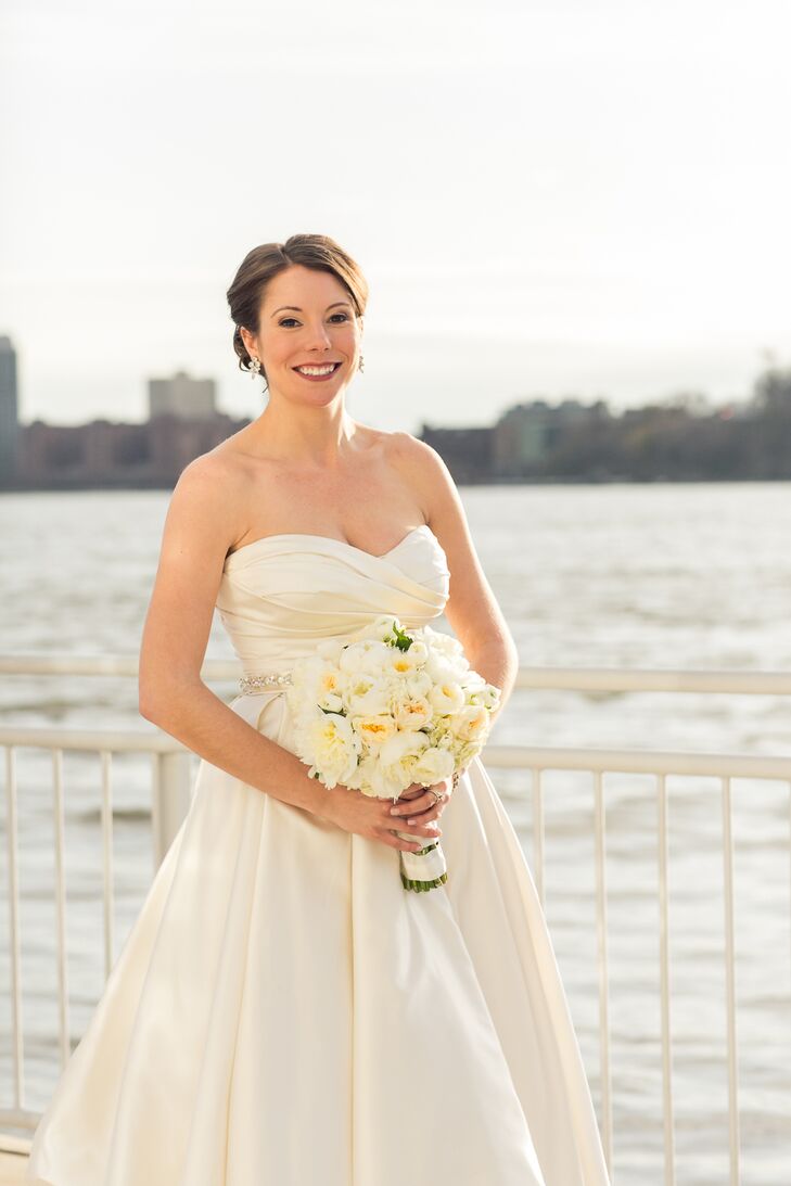 Meghan wore a strapless A-line Pnina Tornai wedding dress. "My consultant immediately suggested the perfect dress to match my vision of classic elegance," she says. "I fell in love with it as soon as I put it on."