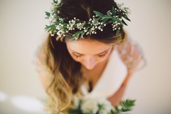 The bride made her own floral crown with floral wire, fresh greenery and baby’s breath while she and her bridesmaids were getting ready. “It was super easy to make, and only took about 20 minutes!” Dana says.