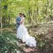 Newlyweds Surrounded by Forest Greenery