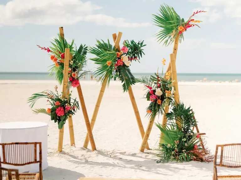 Colorful Florals Decorate This Unique Beach Wedding Ceremony Alter