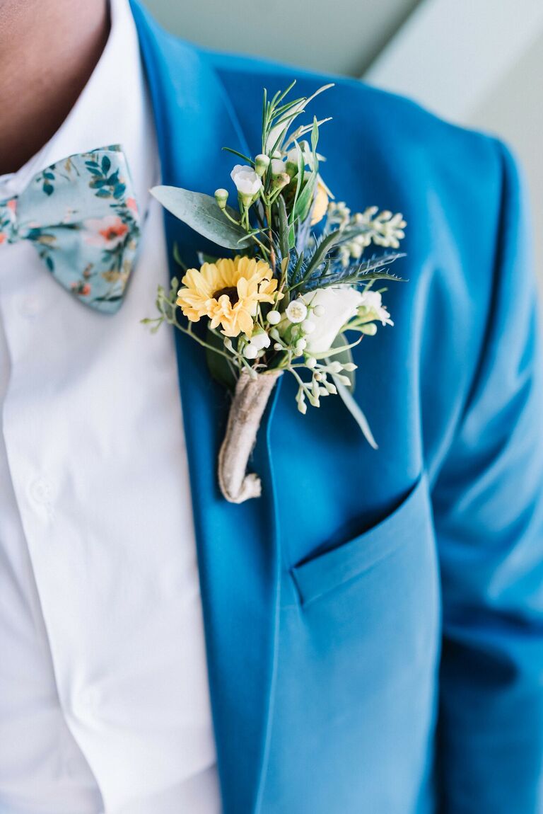 Boutonniere with mini sunflower wrapped in burlap