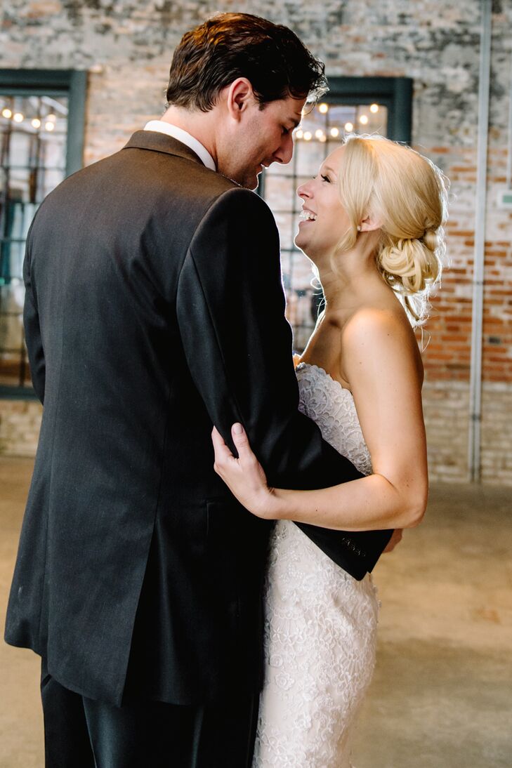 Corinne and John shared their first dance together inside the rustic space at Mount Washington Mill Dye House in Baltimore, Maryland. They danced to “At Last” by Etta James, sung by their wedding band, Infusion.