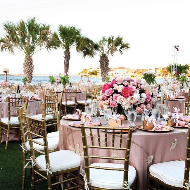 Varying shades of pink in the centerpieces and linens gave the tables visual depth.