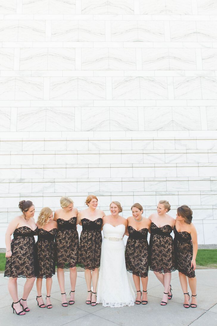 Black lace Amsale bridesmaid dresses popped against Laurie's all-white Eugenia Couture gown.