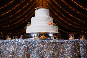 White Wedding Cake and Silver Stand