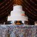 White Wedding Cake and Silver Stand